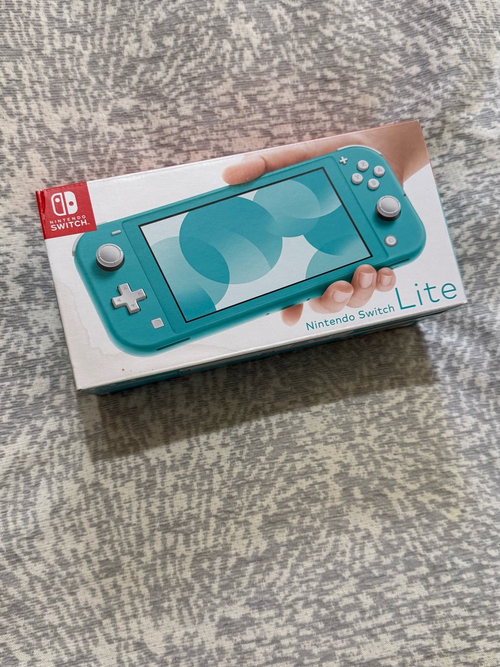 Brand new BNIB Nintendo Switch Lite Teal
